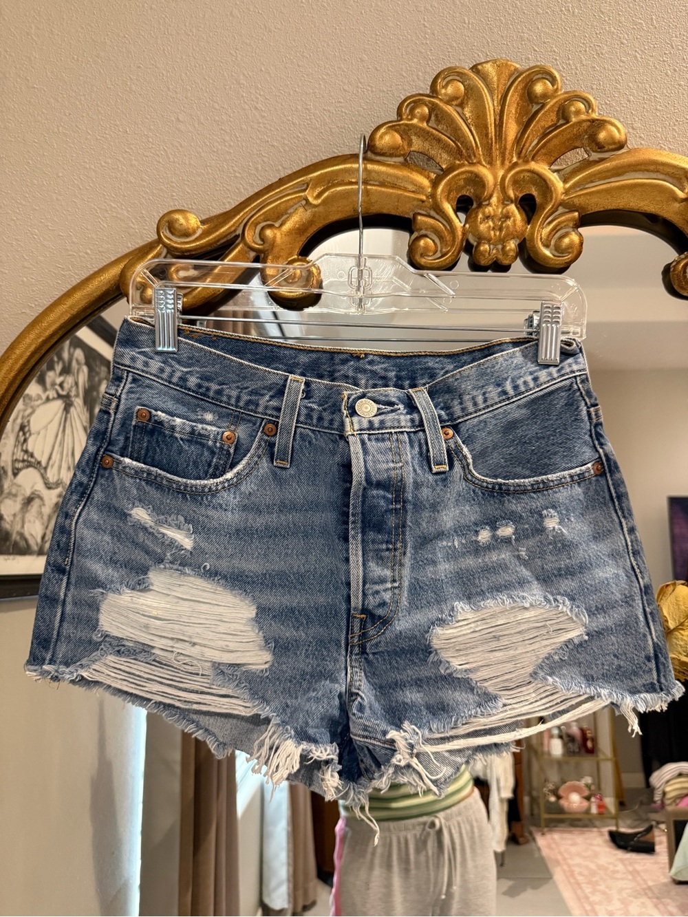 Levi’s Distressed Light Blue High-Rise Denim Shorts